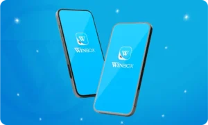 The beginning of Winbox Malaysia official platform displayed on mobile screens with the signature blue logo background